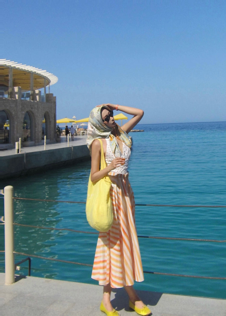 Xiaoli Yuxia ChengqiホルターネックサスペンダーVネックドレス春と夏のドーパミンティーブレイクフランスのAラインロングスカート