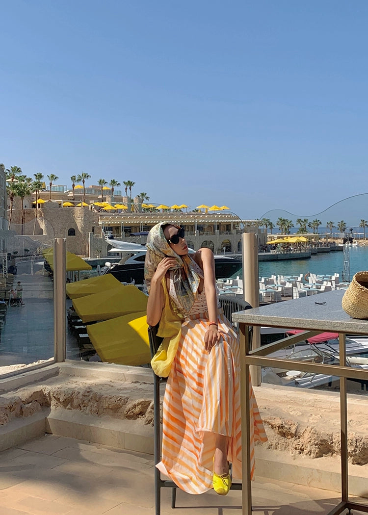 Xiaoli Yuxia ChengqiホルターネックサスペンダーVネックドレス春と夏のドーパミンティーブレイクフランスのAラインロングスカート